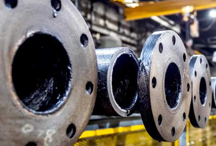 Is Cast Iron More or Less Ductile in Compression?